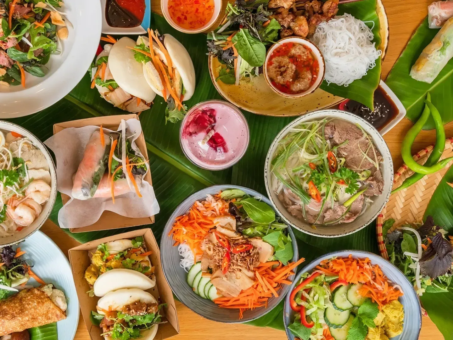 Vietnamese catering dishes prepared for a shared event table